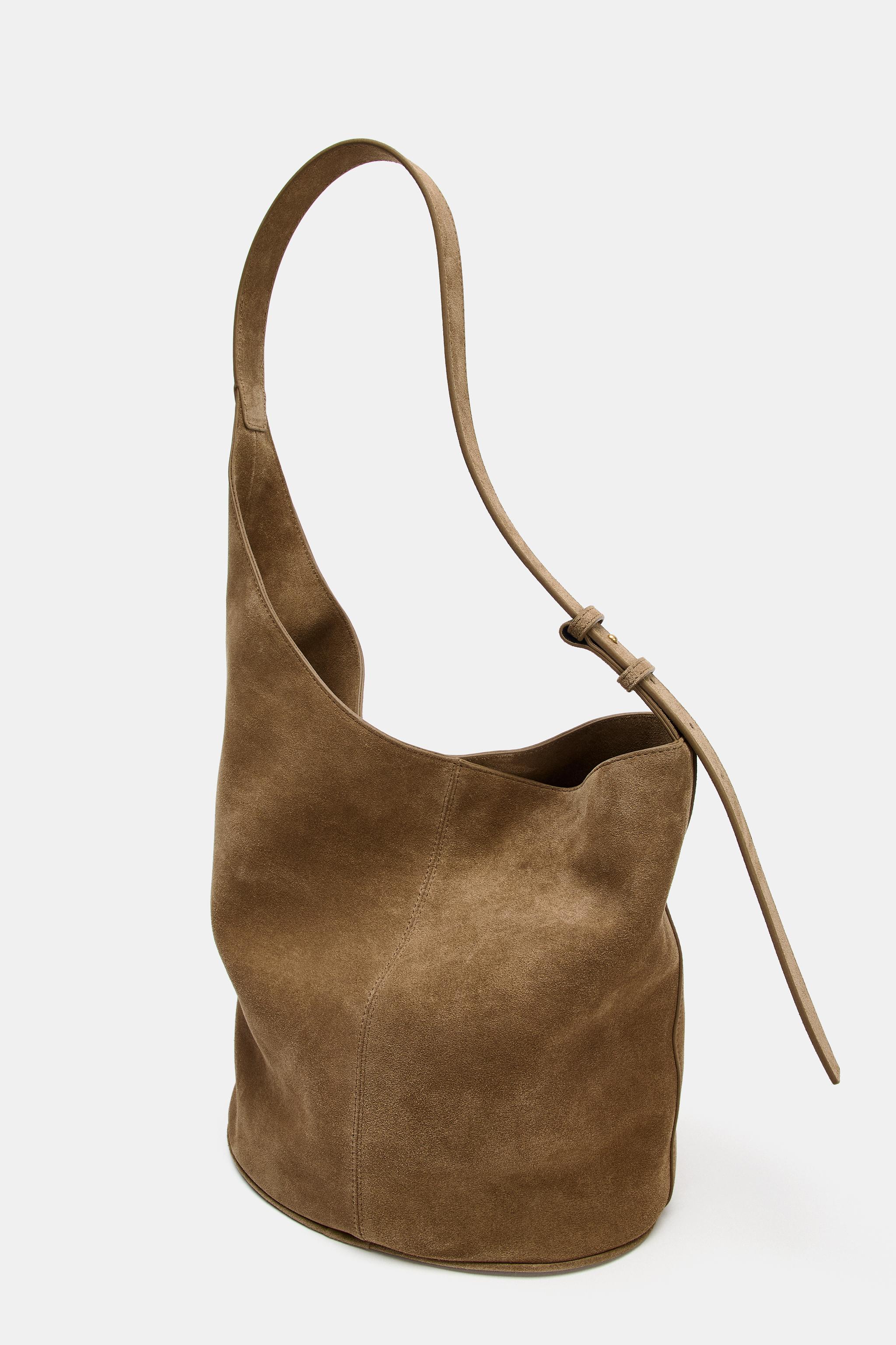 ASYMMETRIC LEATHER BUCKET BAG